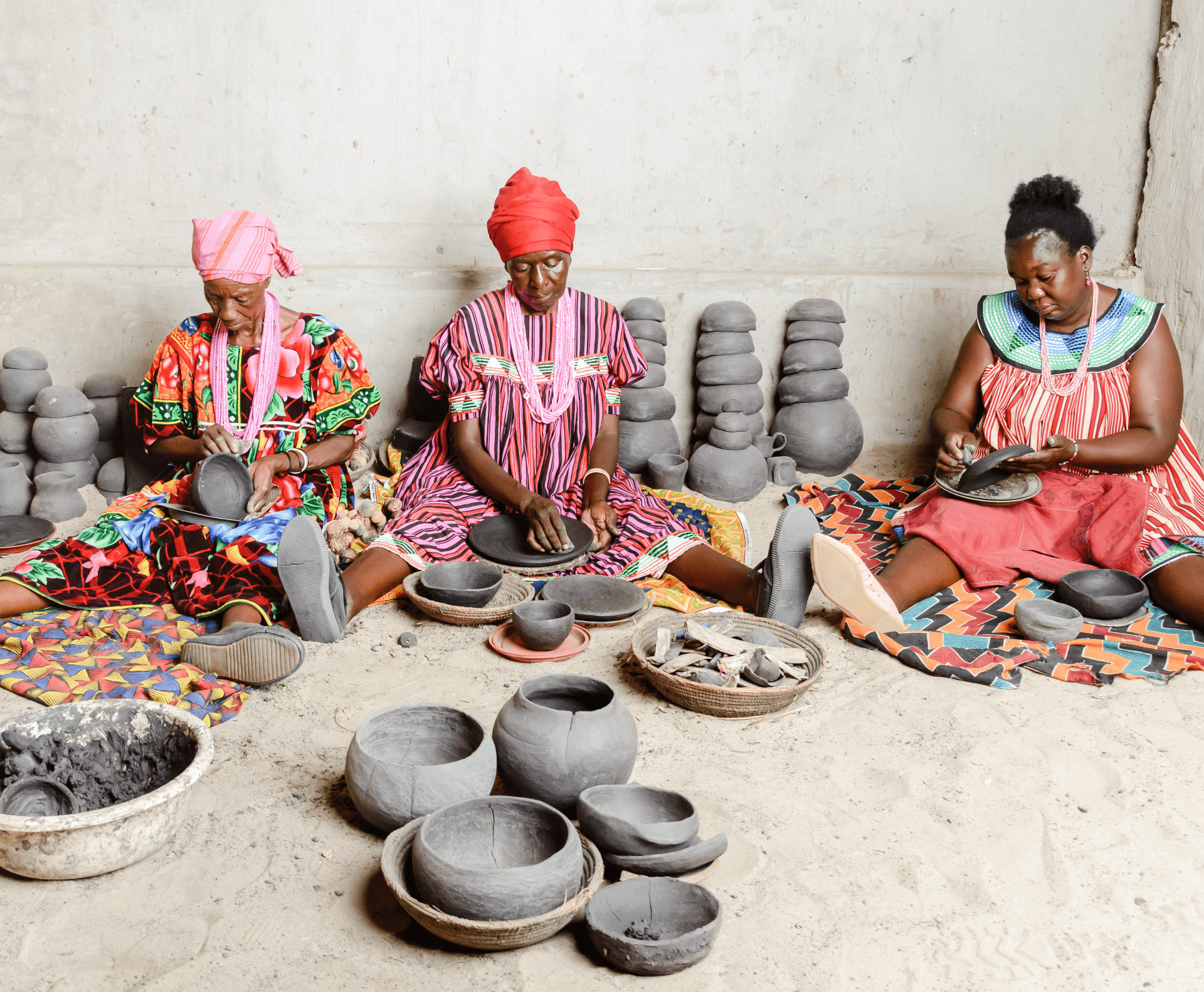 three women are making pottery three women are making pottery